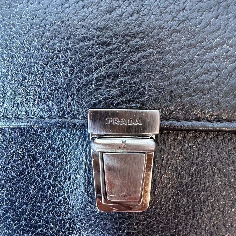 Prada Black Leather Wallet with Silver Clasp